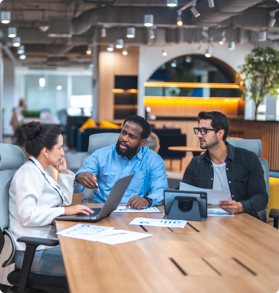 Team discussing in modern office setting